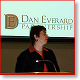 Lou Everard speaking at a conference